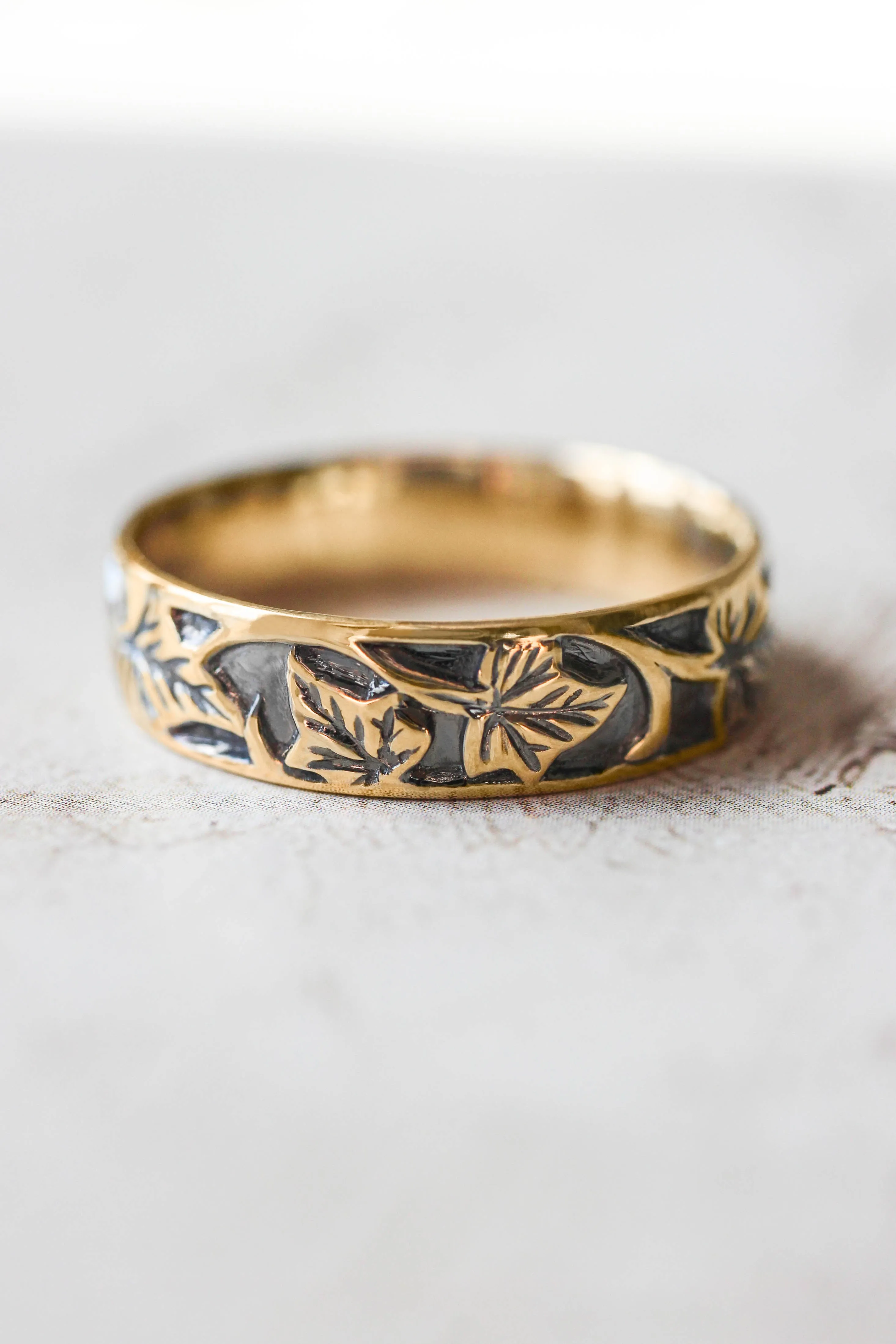 Black and gold wedding band for man, ivy leaves ring