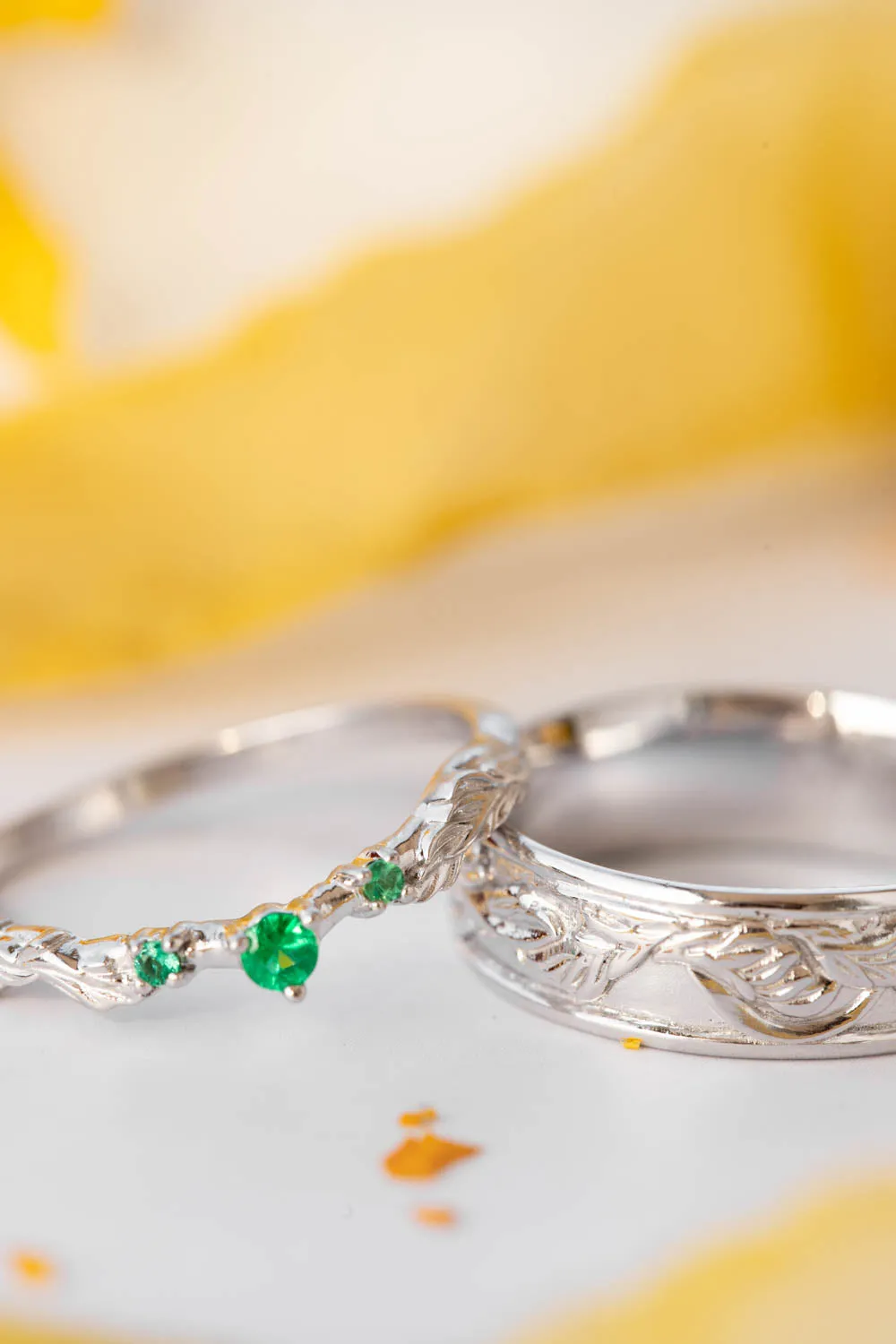 Wedding rings set for couple: white gold leaf ring for man, emeralds ring for woman